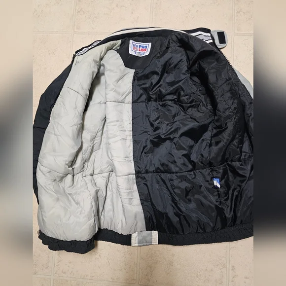 Vintage 1990's (L) Oakland Raiders Pro Line Starter Zip-Up Jacket & Backpack